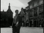 Horní část Masarykova náměstí, domy č.p. 16, 17, 18 (dnes Elektro Viki). Vlevo Mléčné lahůdky Daňkovský č.p. 27. Uprostřed Rynárecká brána.